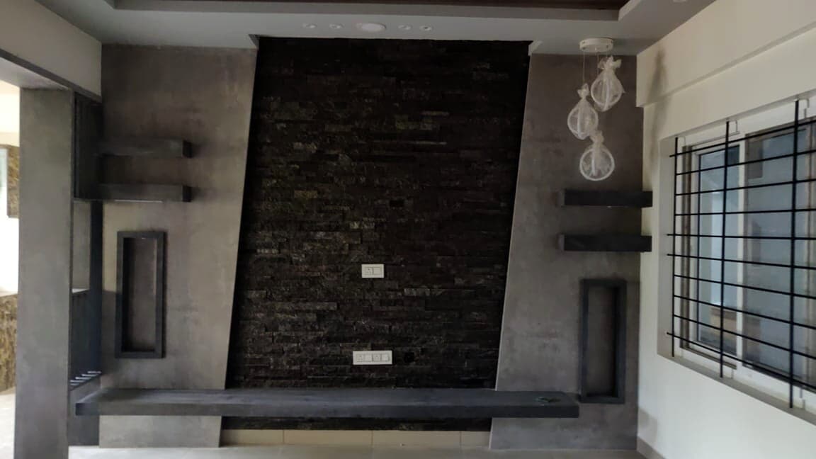 Black Stone Tv Wall Panel from an Abya completed interior project