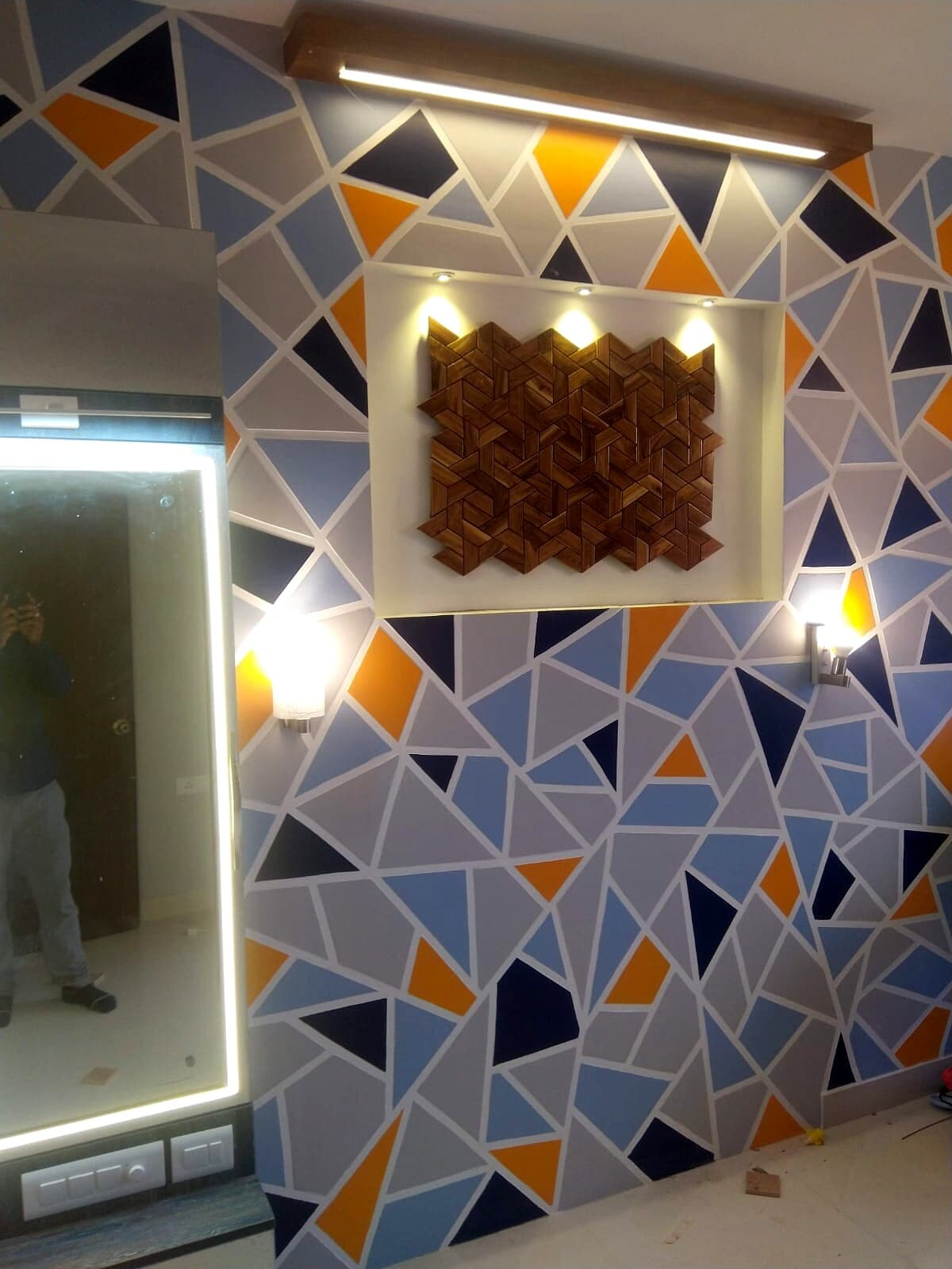 Geometric Accent Wall Led Mirror from an Abya completed interior project