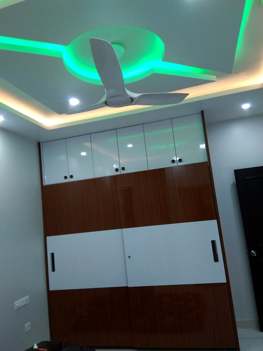 Green Cove Ceiling Bedroom Wardrobe from an Abya completed interior project