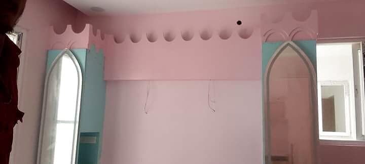 Pink Kids Room Arched Mirror Cabinet from an Abya completed interior project