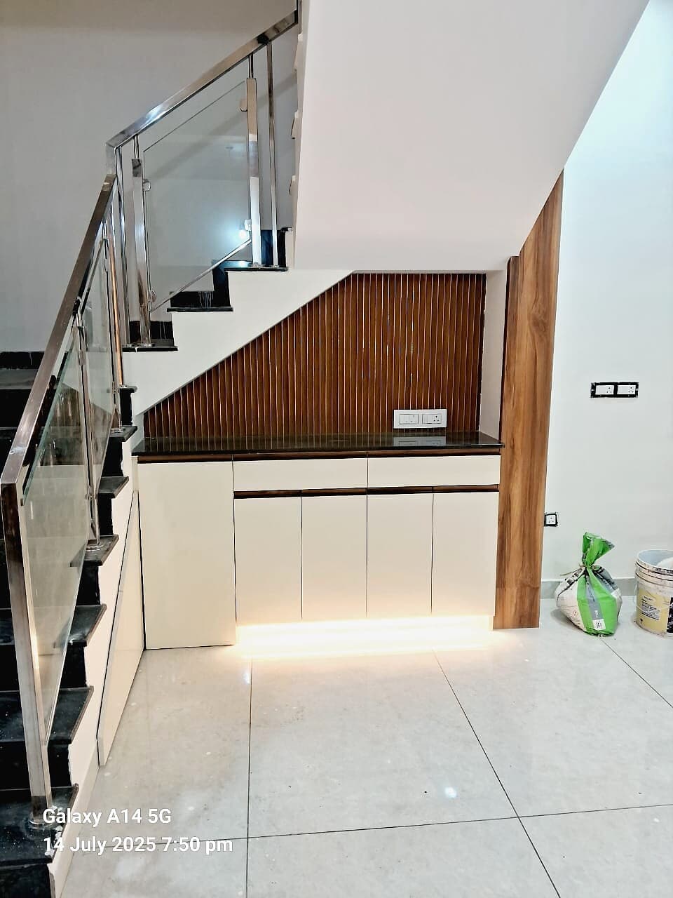 Staircase Under Storage Wood Panels from an Abya completed interior project