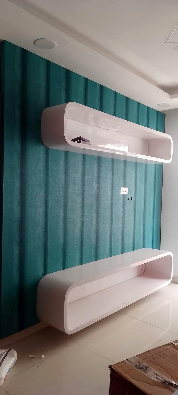 Teal Wall Mounted Tv Cabinet from an Abya completed interior project