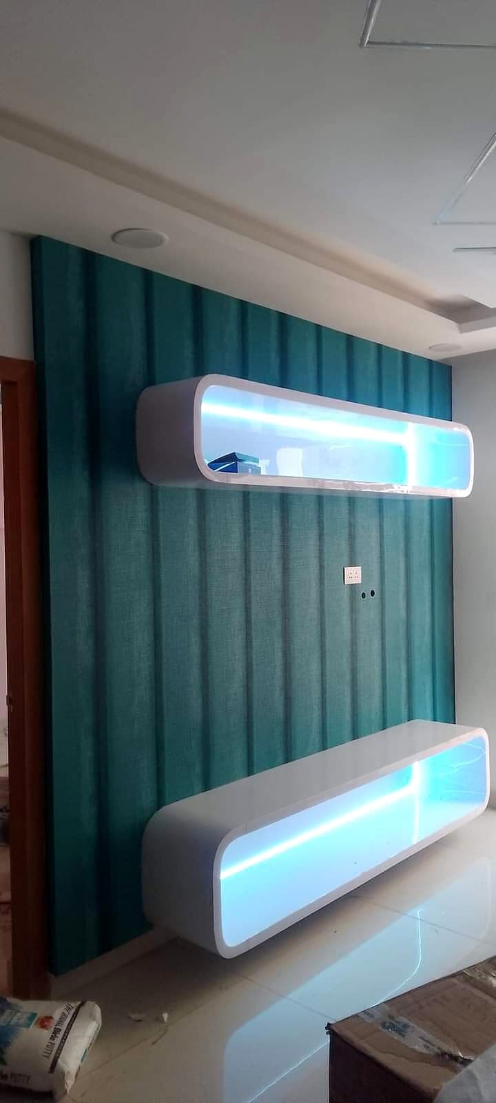 Teal Wall Mounted Tv Cabinet from an Abya completed interior project