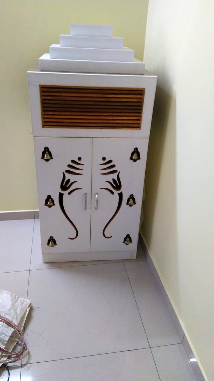 Wall Mounted White Pooja Cabinet from an Abya completed interior project