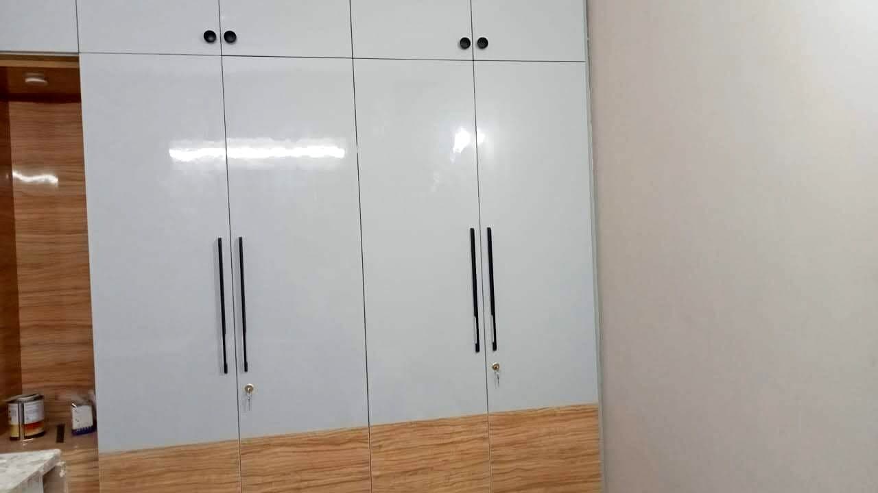 White Wardrobe Wood Base Panel from an Abya completed interior project