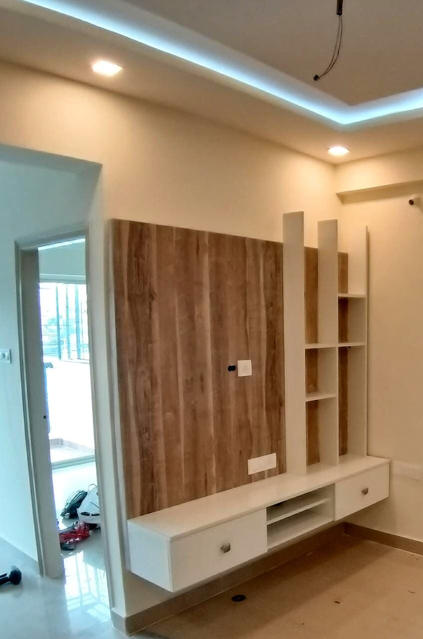 Wood Tv Wall Panel Shelves from an Abya completed interior project