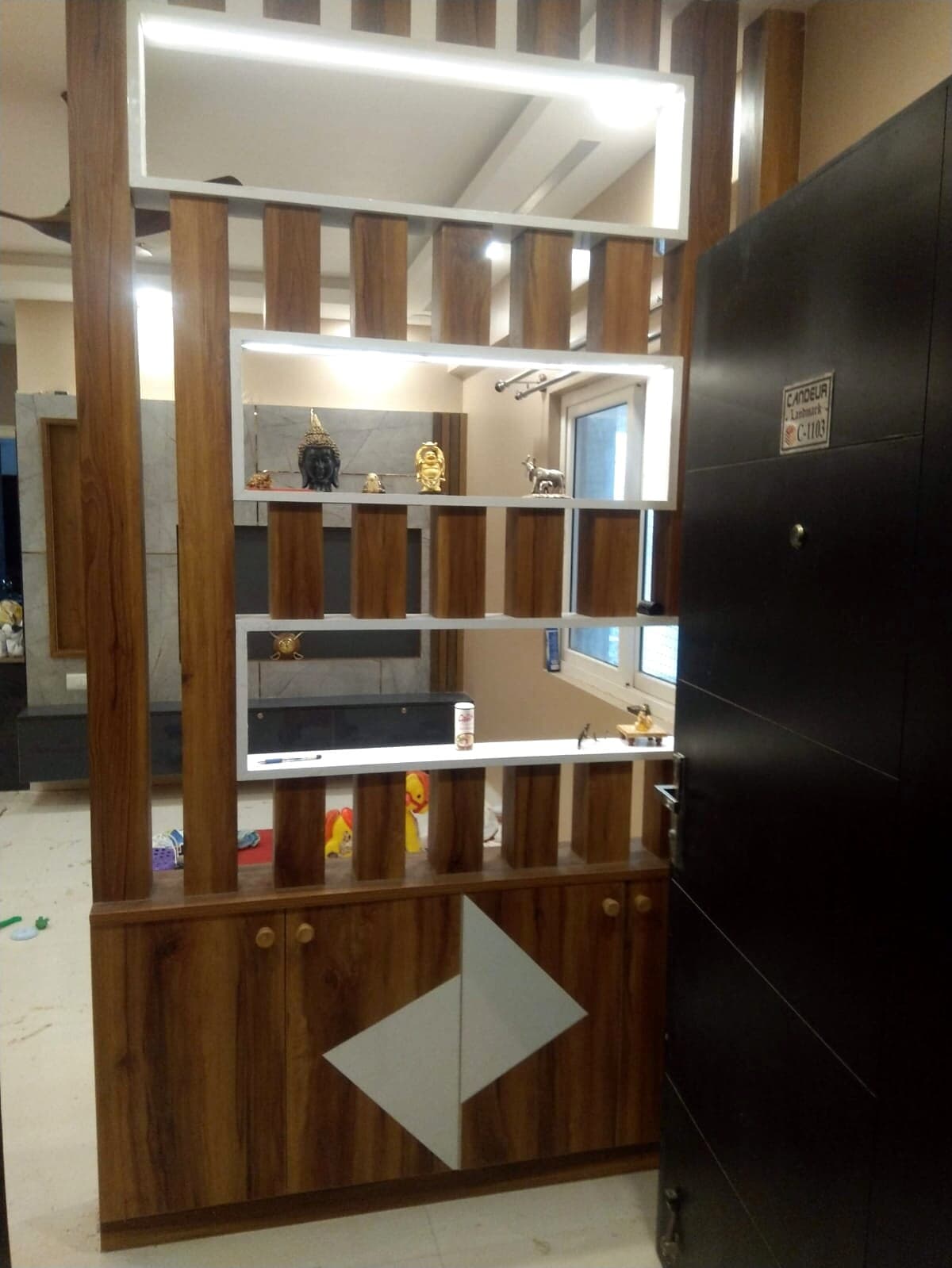 Wooden Entry Partition Display Cabinet from an Abya completed interior project